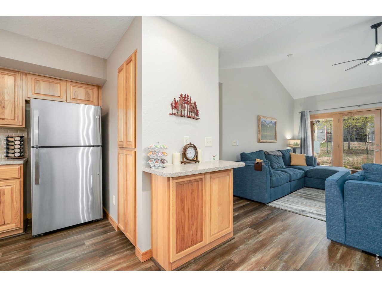 1761 Wildfire Road Estes Park, CO 80517 - Photo 17 of 45 a living room with stainless steel appliances furniture and a refrigerator