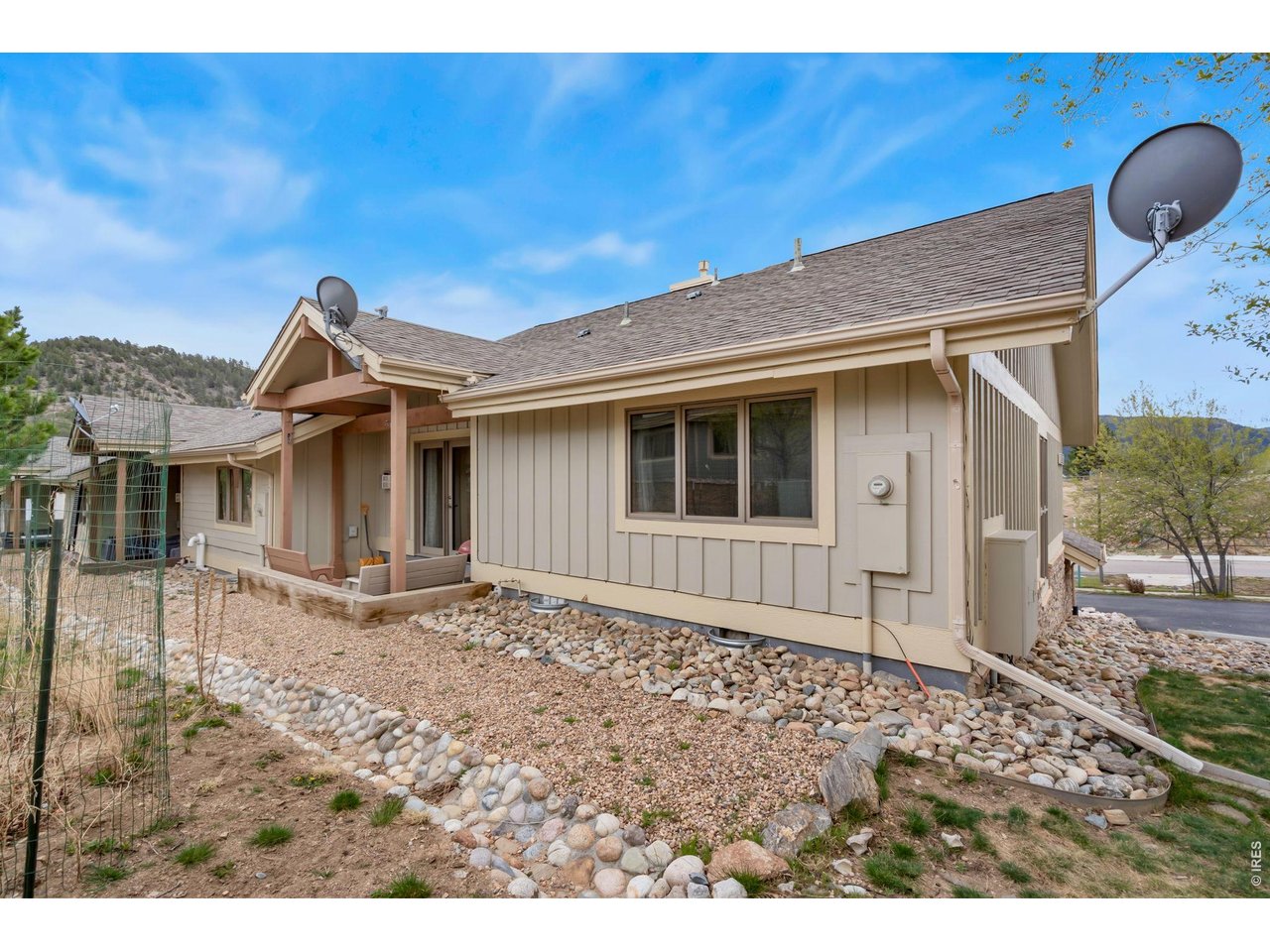 1761 Wildfire Road Estes Park, CO 80517 - Photo 34 of 45 a view of a house with wooden fence