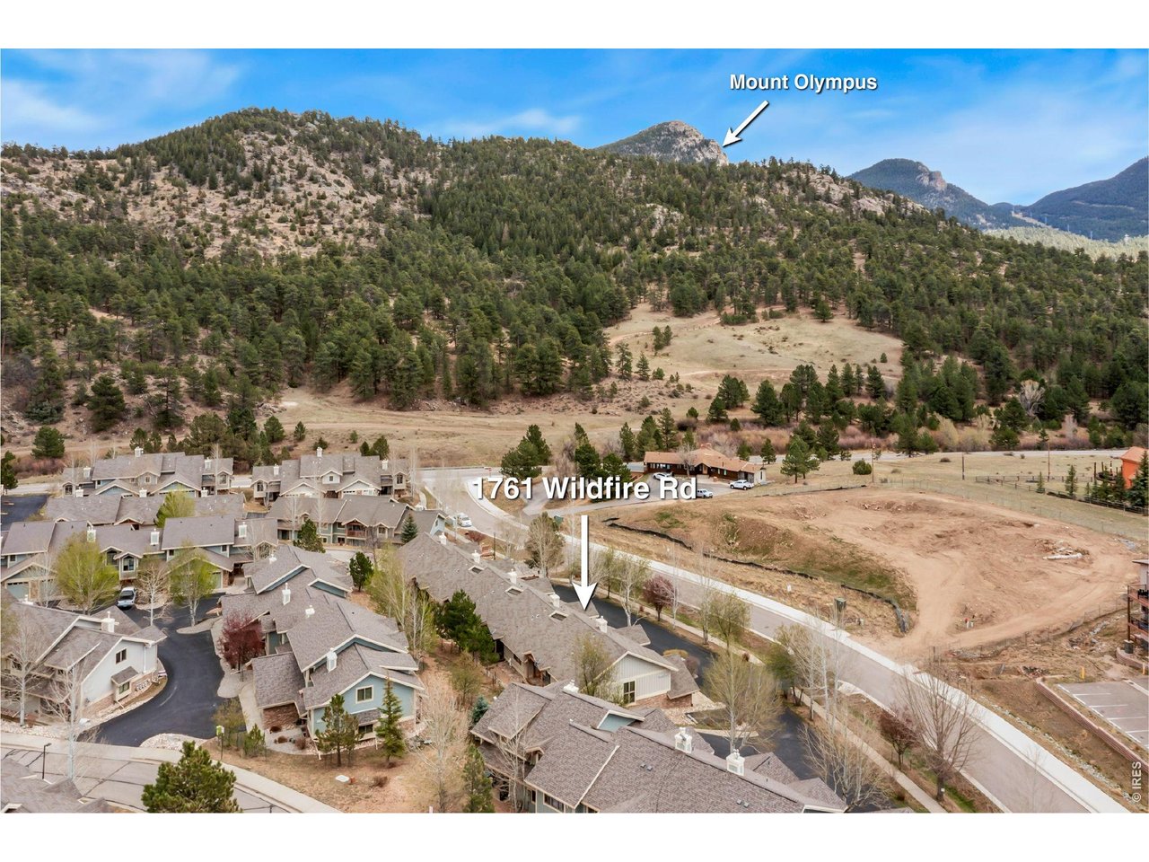 1761 Wildfire Road Estes Park, CO 80517 - Photo 37 of 45 a view of a town with mountains in the background