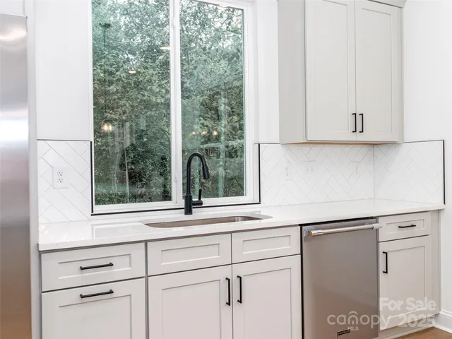 a view of a window and cabinets