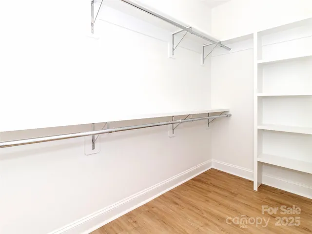 a view of a room with racks on the wall