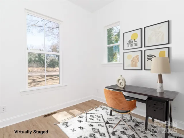 a workspace with furniture and window