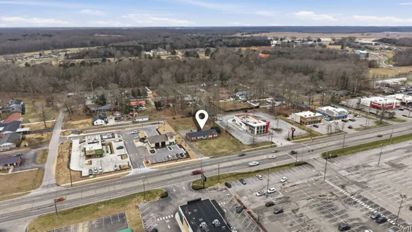 an aerial view of a highlighted house