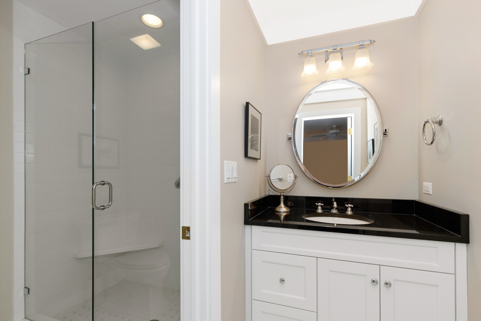 240 Deerfield Road Deerfield, IL 60015 - Photo 20 of 37 a bathroom with a double vanity sink and a mirror