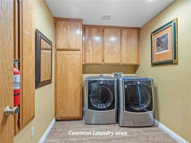 a bedroom with bed and large window