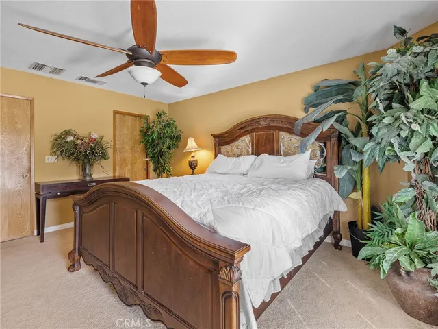 a view of a bathroom with a granite countertop sink and a mirror