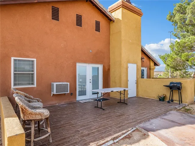a view of a big house with a yard
