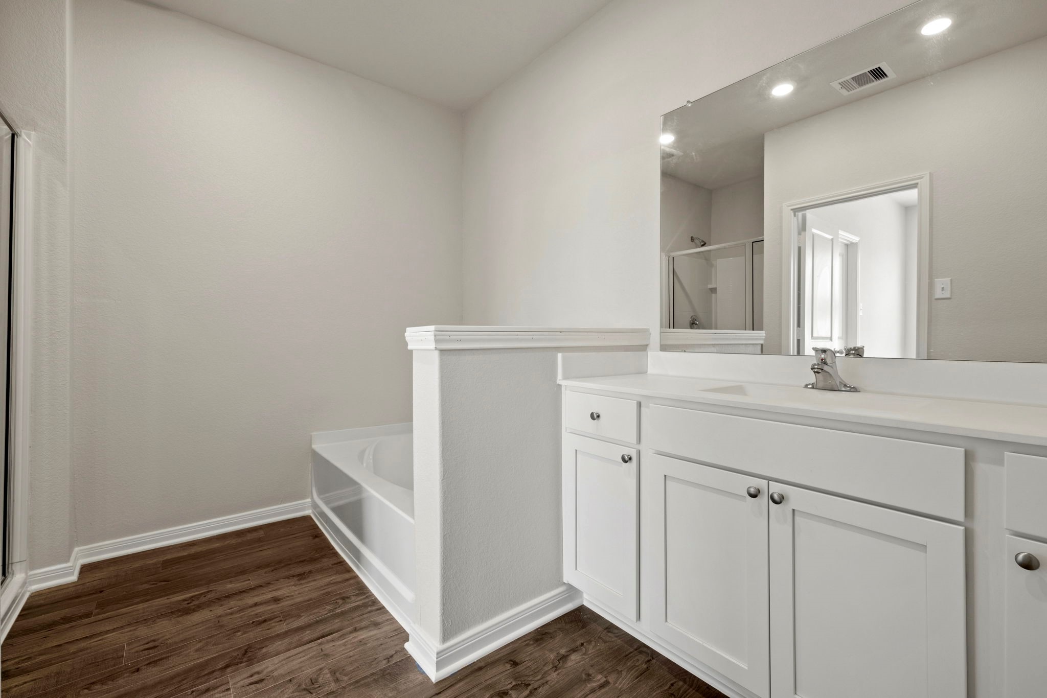 7610 Thrips Lane Richmond, TX 77469 - Photo 11 of 20 a bathroom with a sink and a mirror
