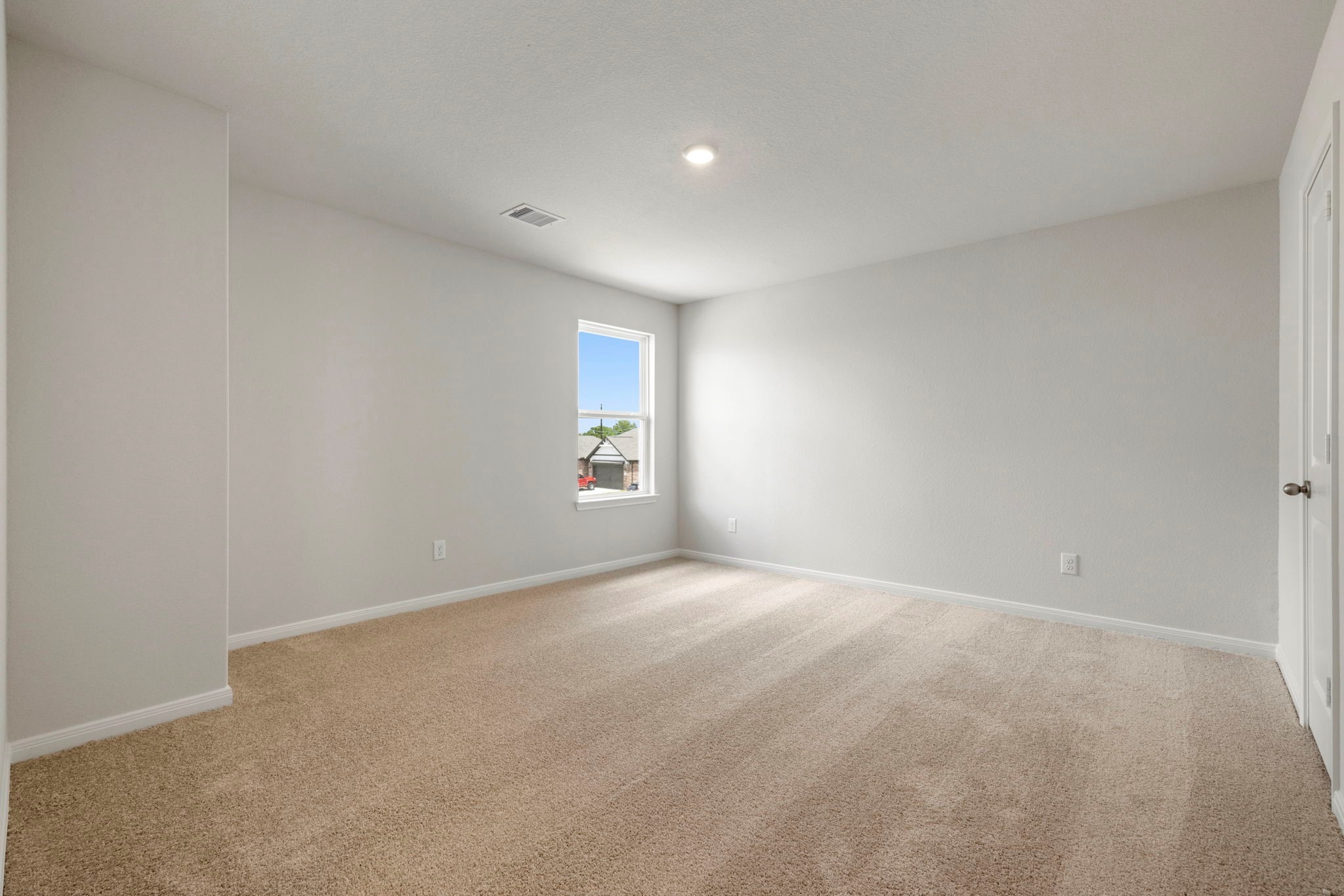 7610 Thrips Lane Richmond, TX 77469 - Photo 16 of 20 an empty room with windows