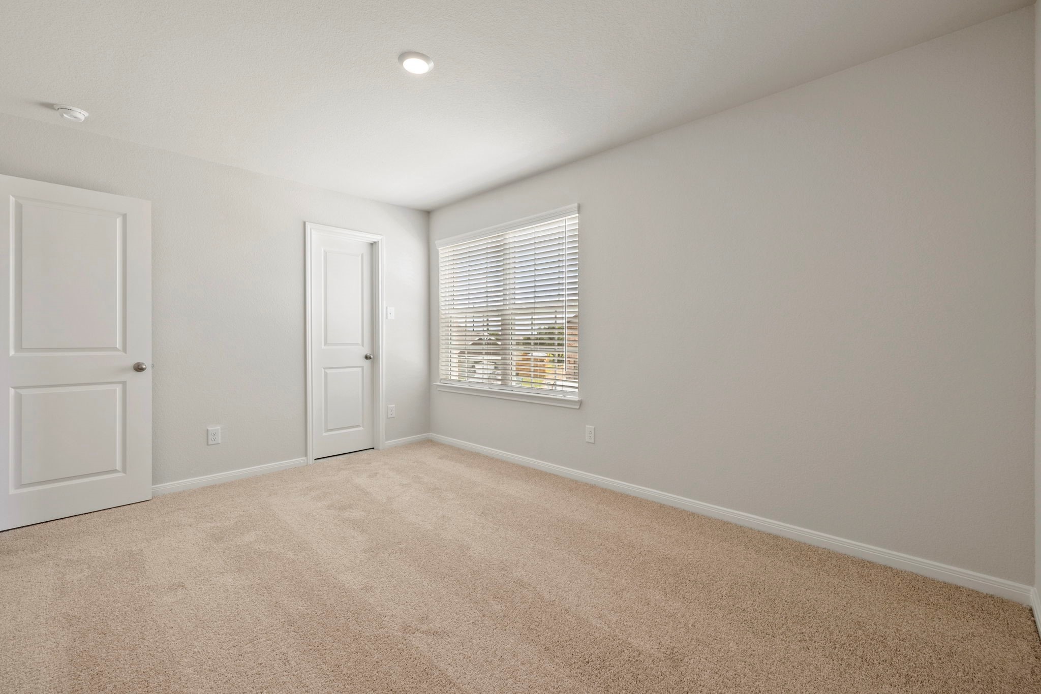 7610 Thrips Lane Richmond, TX 77469 - Photo 19 of 20 an empty room with windows