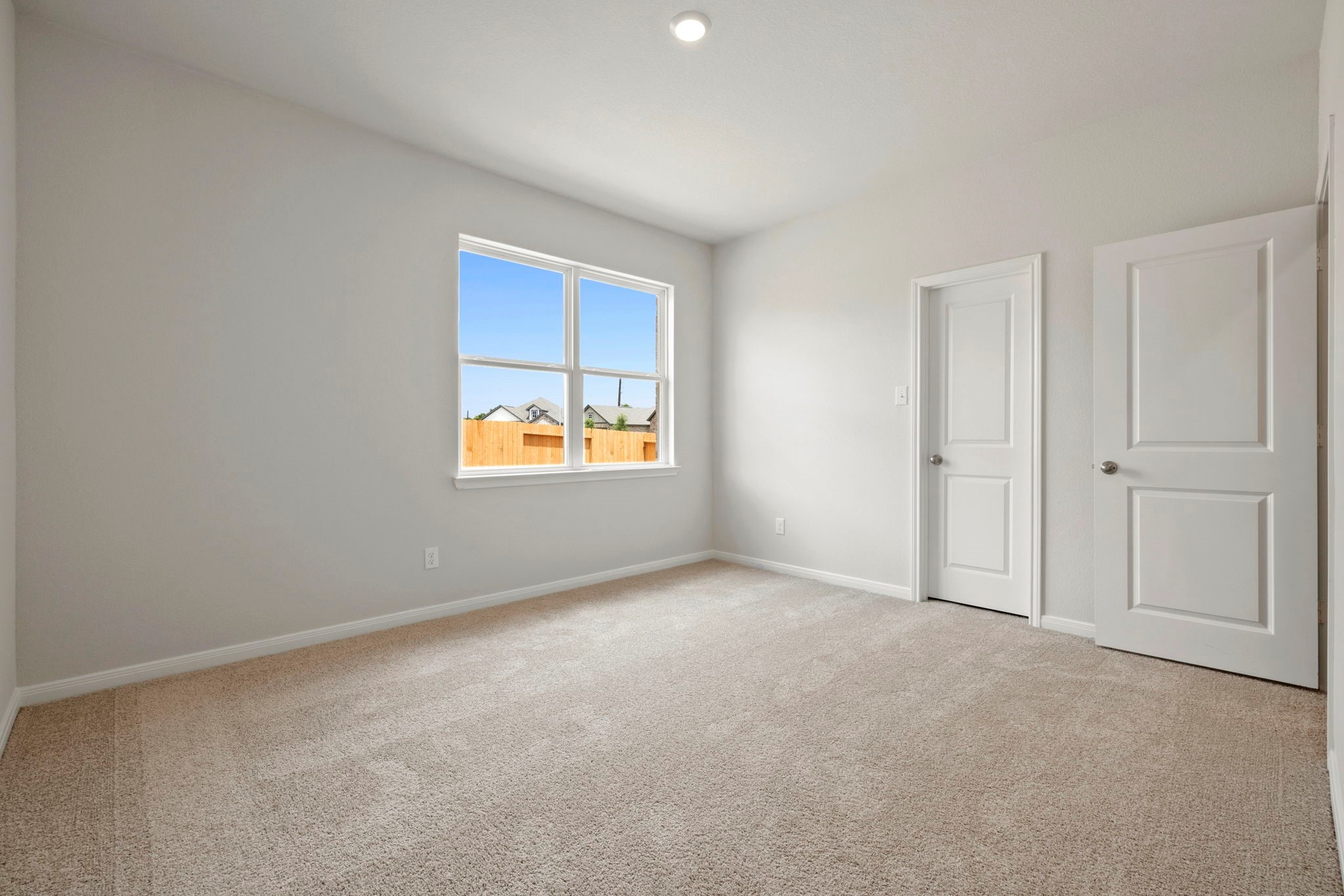 7610 Thrips Lane Richmond, TX 77469 - Photo 10 of 20 a view of an empty room with a window