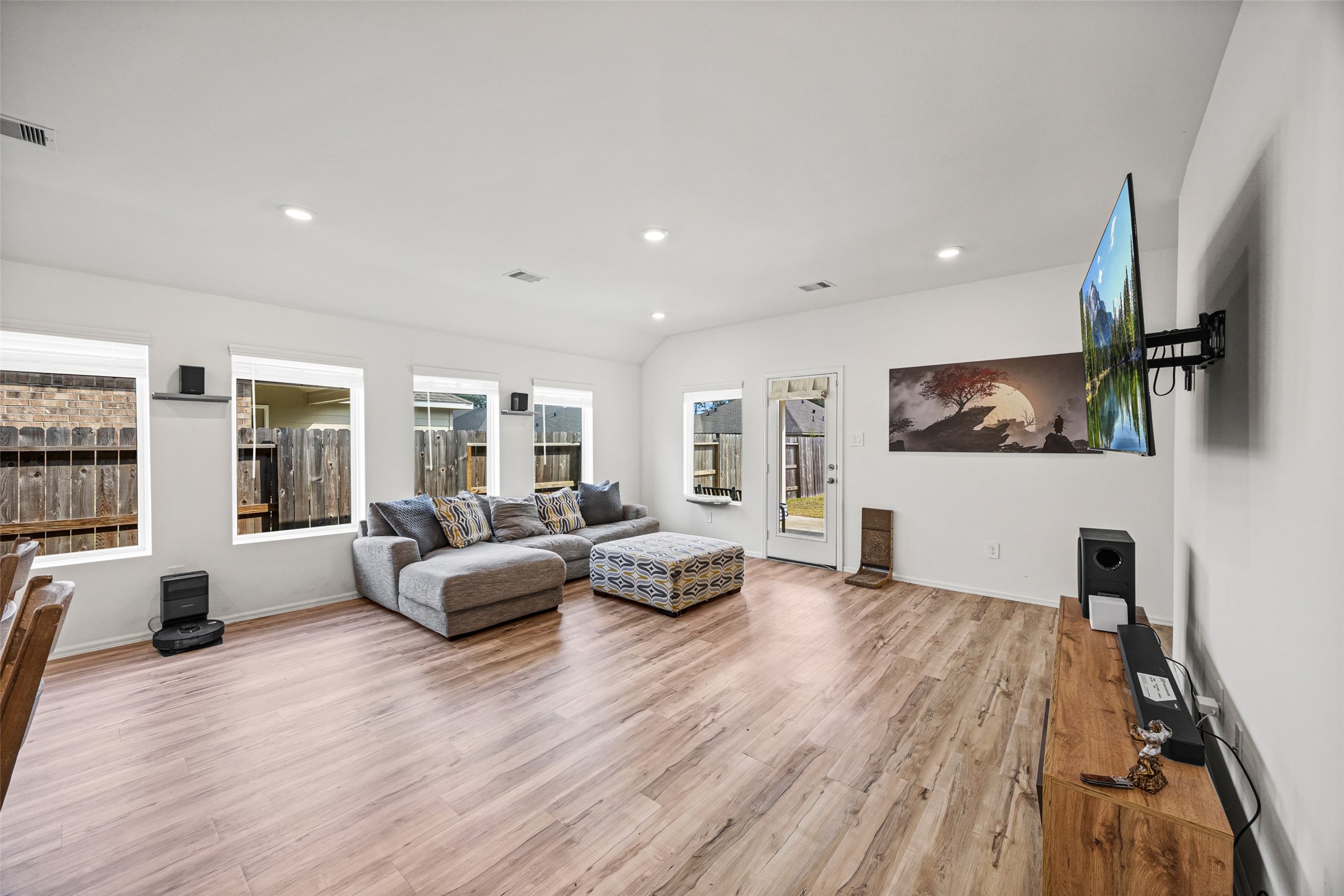 2822 Paradise Ridge Way Conroe, TX 77301 - Photo 12 of 21 a living room with furniture window and wooden floor