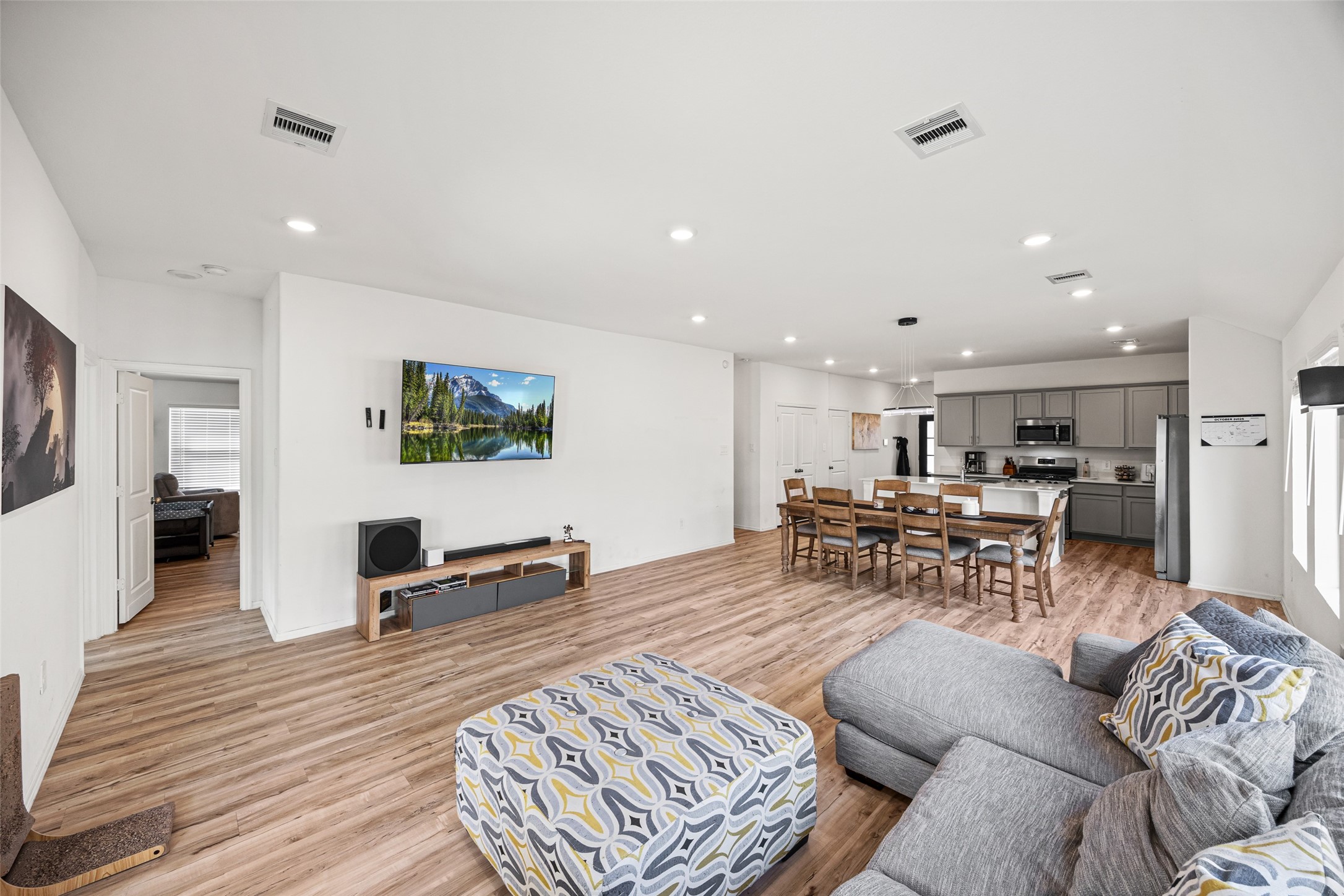 2822 Paradise Ridge Way Conroe, TX 77301 - Photo 13 of 21 a living room with furniture and wooden floor