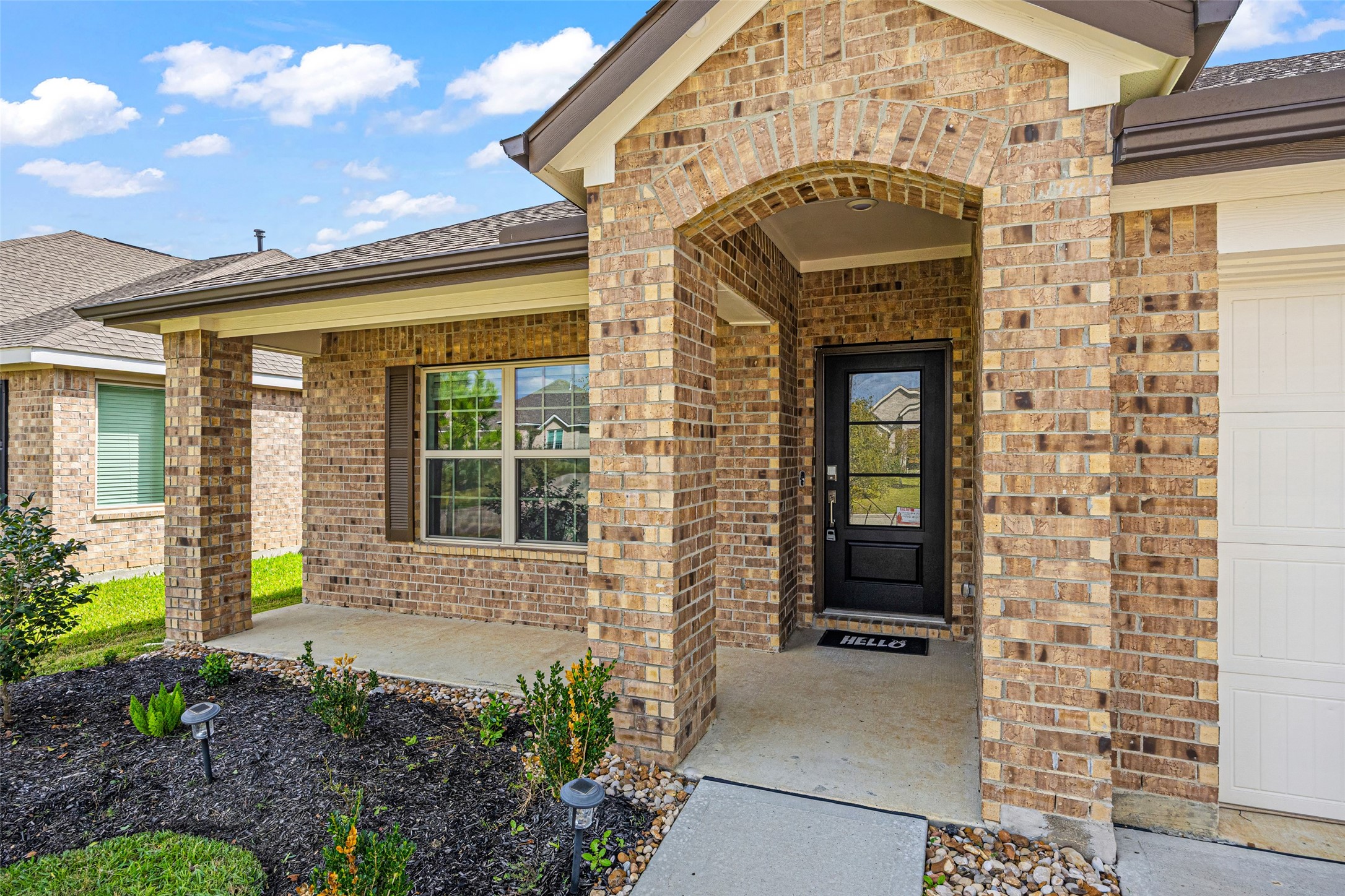 2822 Paradise Ridge Way Conroe, TX 77301 - Photo 4 of 21 a front view of a house with a glass windows