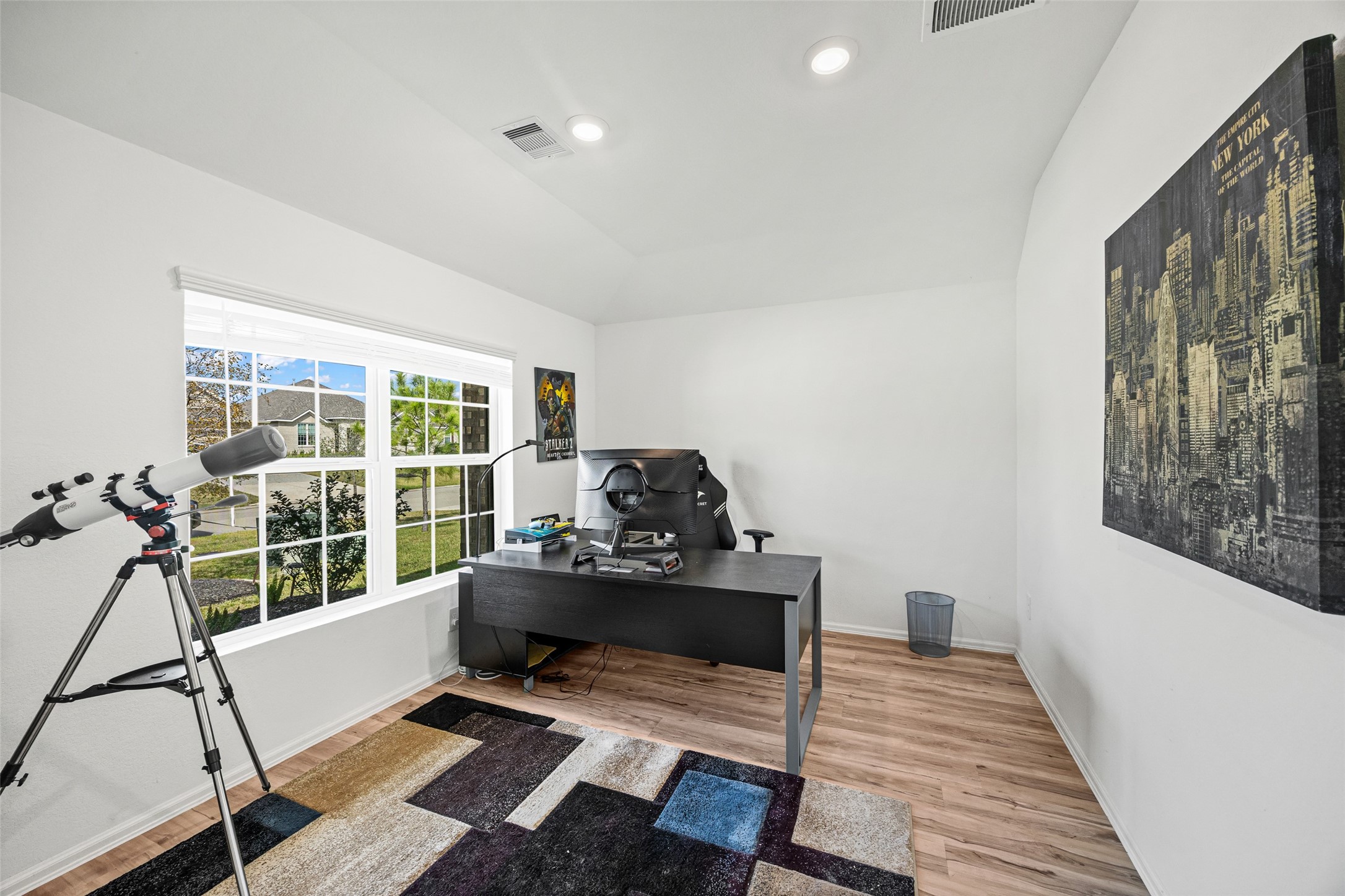 2822 Paradise Ridge Way Conroe, TX 77301 - Photo 6 of 21 a living room with furniture and a floor to ceiling window