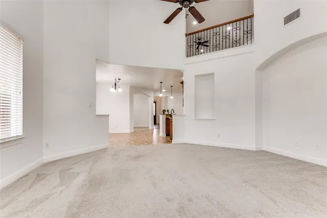 a view of a livingroom with a staircase