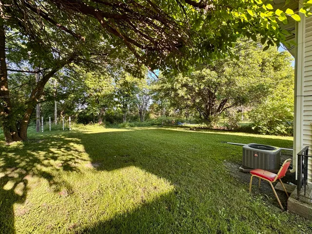 a view of lake with green space