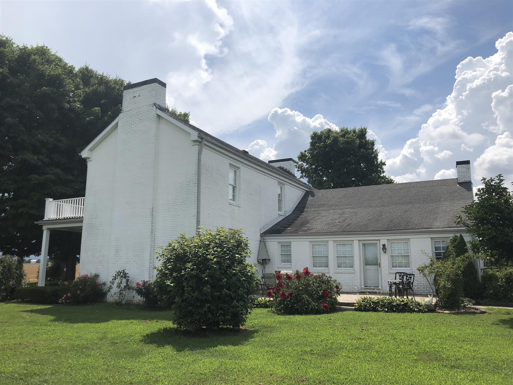 1108 Steele Road Franklin, KY 42134 - Photo 2 of 20 a view of a yard in front of a house