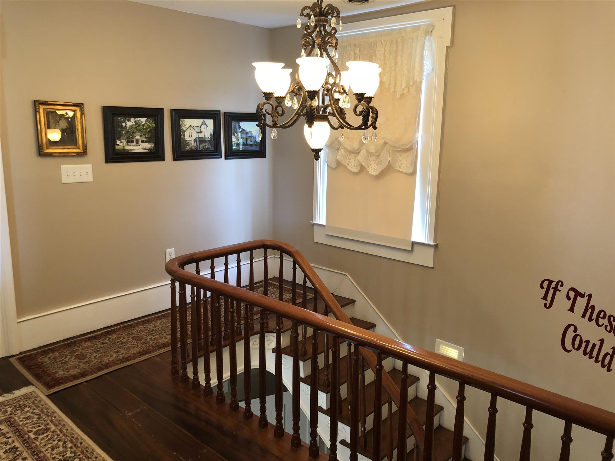 1108 Steele Road Franklin, KY 42134 - Photo 7 of 20 a view of a balcony wooden floor and chandelier