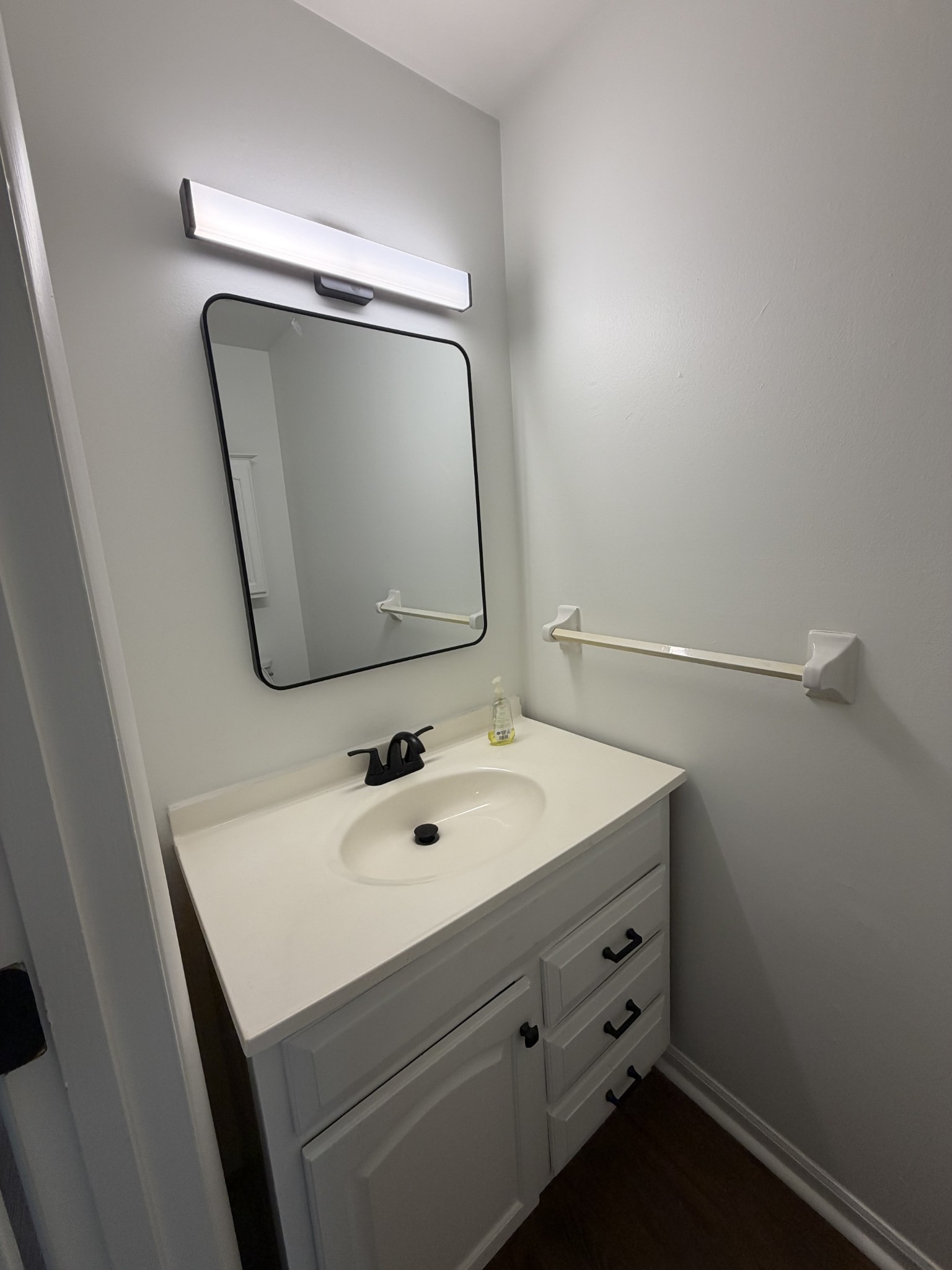 1100 West Main Street, Unit F7 Franklin, TN 37064 - Photo 3 of 10 a bathroom with a sink and a mirror