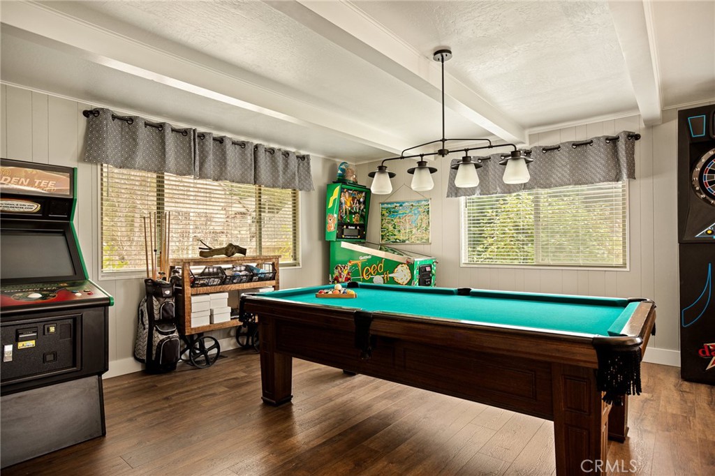 435 Riviera Drive Lake Arrowhead, CA 92352 - Photo 15 of 39 a room with musical instrument pool table furniture wooden floor and windows