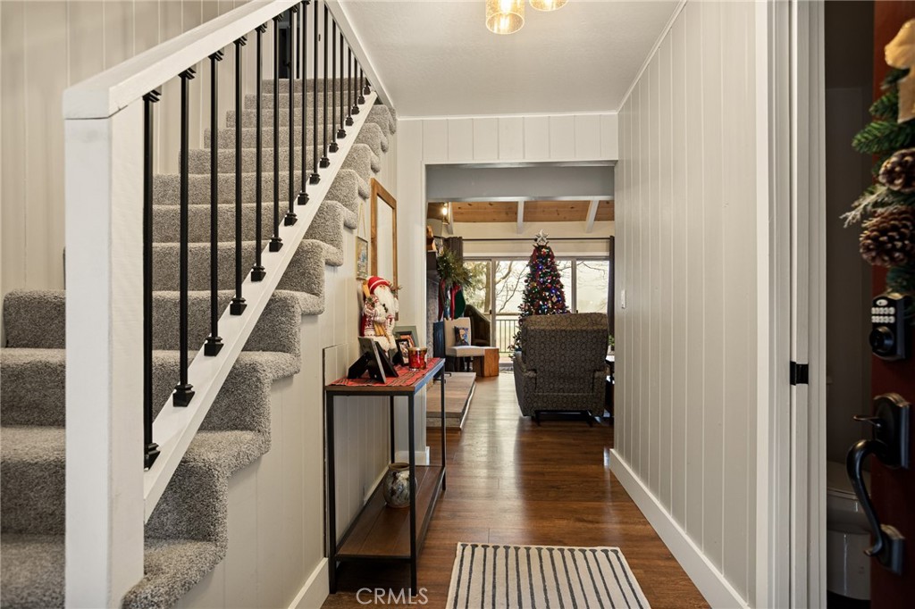 435 Riviera Drive Lake Arrowhead, CA 92352 - Photo 28 of 39 a view of staircase with wooden floor and a rug