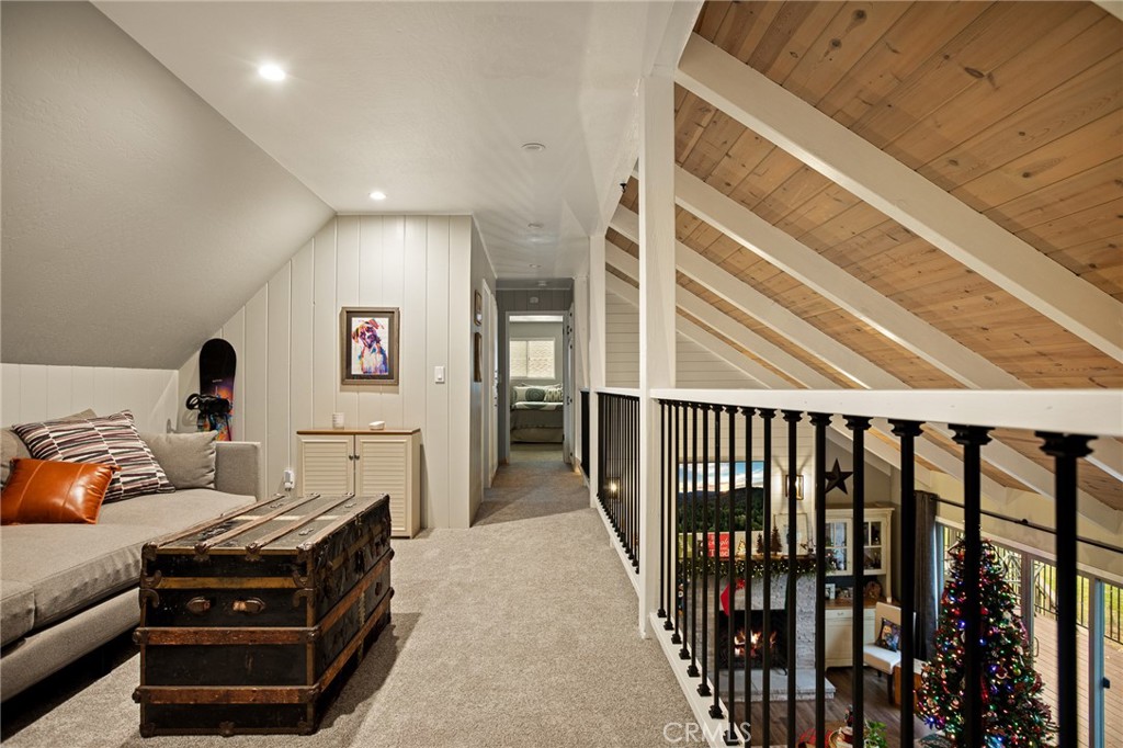 435 Riviera Drive Lake Arrowhead, CA 92352 - Photo 33 of 39 a living room with furniture windows and a flat screen tv