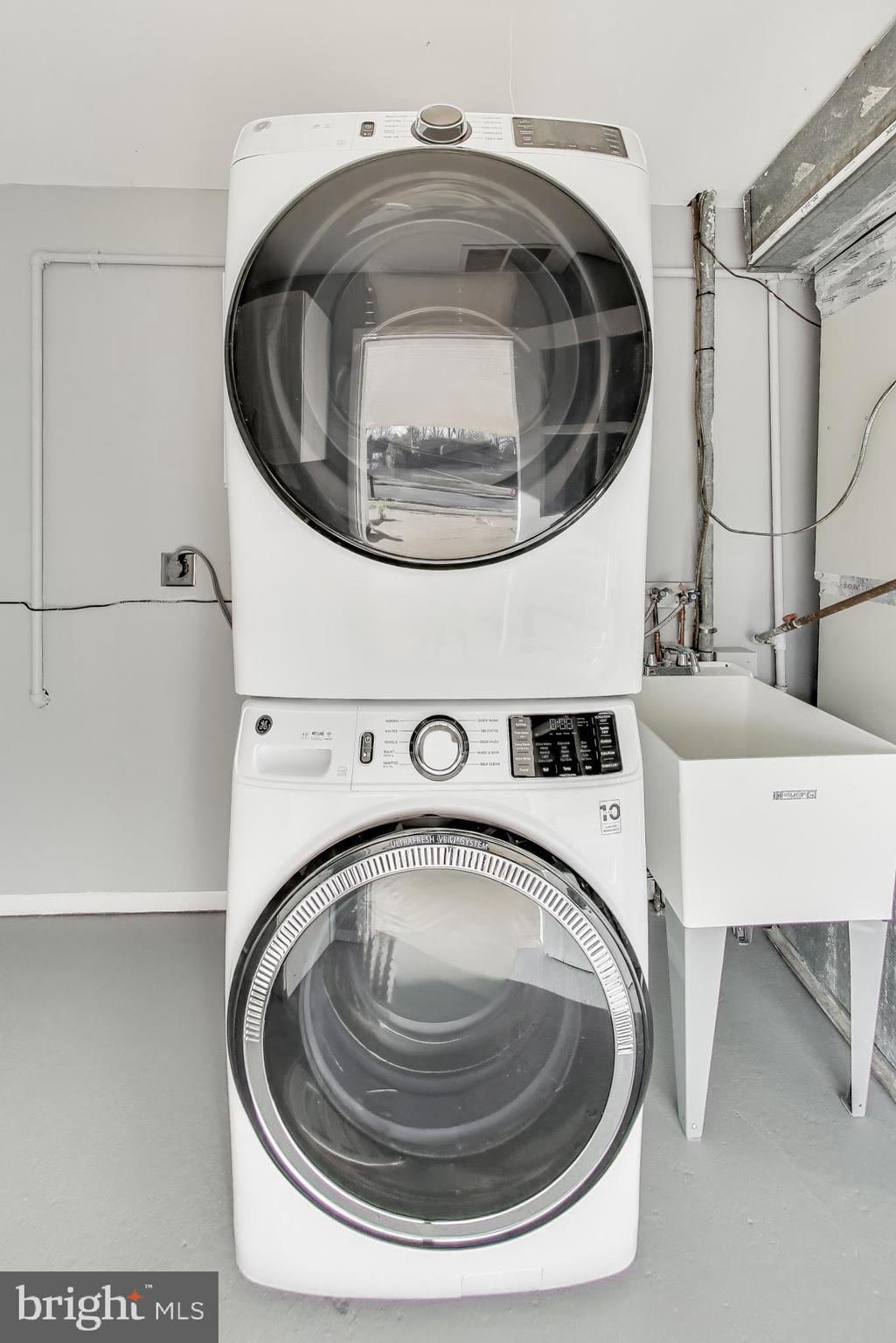 7402 Inzer Street Springfield, VA 22151 - Photo 23 of 49 a utility room with dryer and washer