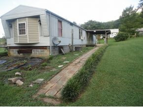 124 Ug Buckles Road Elizabethton, TN 37643 - Photo 1 of 5 covered back porch