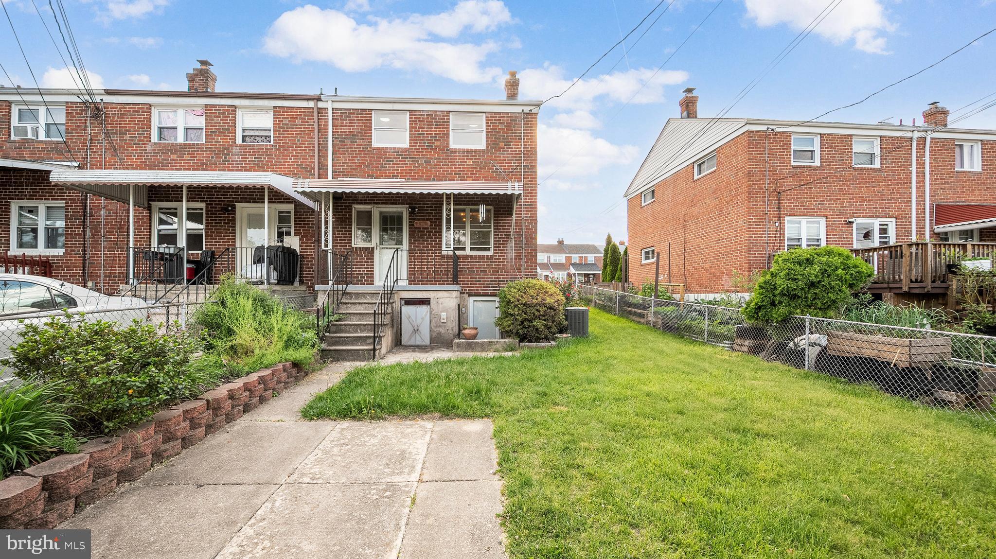 7913 Charlesmont Road Baltimore, MD 21222 - Photo 25 of 27 a front view of a building with garden