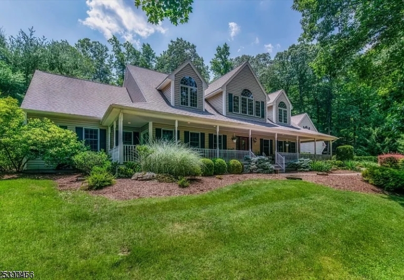 190 Andover Mohawk Road Andover, NJ 07821 - Photo 1 of 46 a front view of a house with a garden
