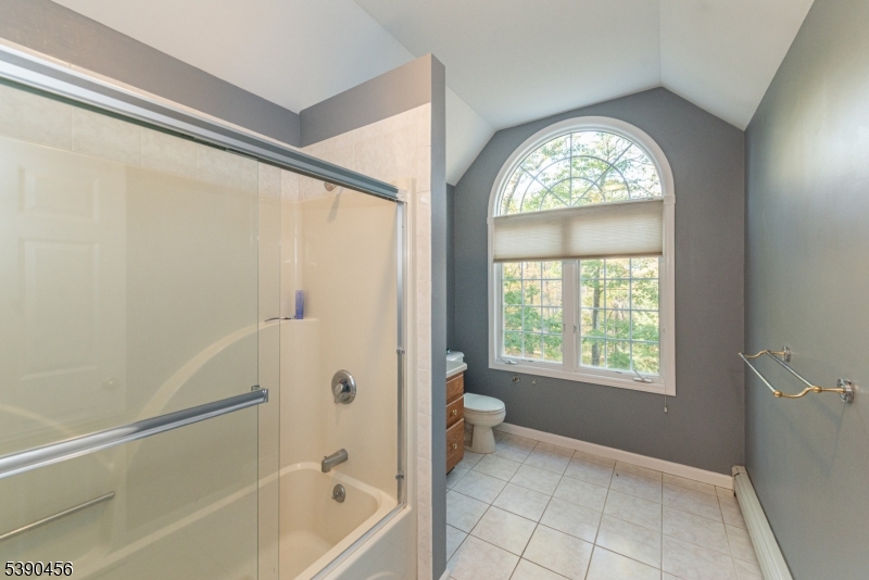 190 Andover Mohawk Road Andover, NJ 07821 - Photo 15 of 46 a bathroom with a bathtub and a shower