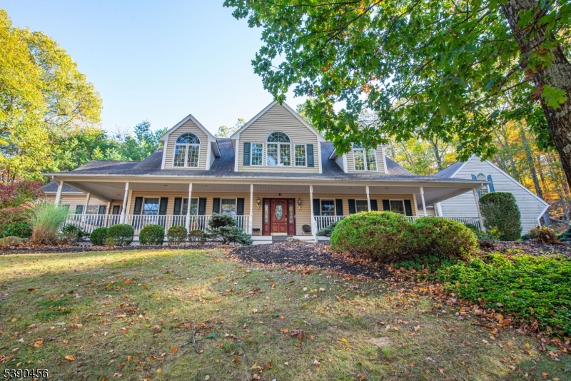 190 Andover Mohawk Road Andover, NJ 07821 - Photo 2 of 46 a front view of a house with a garden