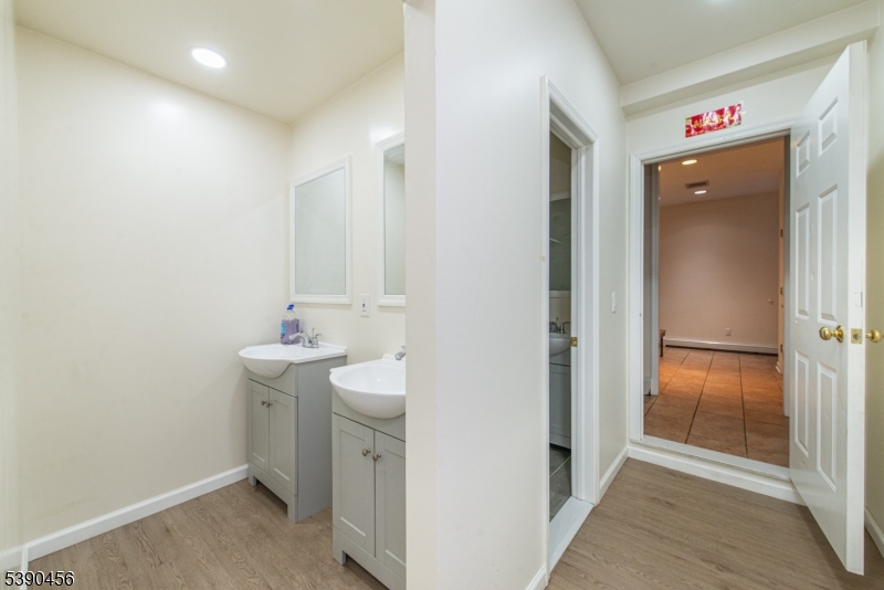 190 Andover Mohawk Road Andover, NJ 07821 - Photo 35 of 46 a bathroom with a sink and a mirror