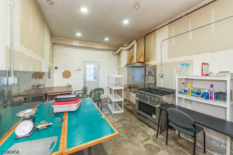 190 Andover Mohawk Road Andover, NJ 07821 - Photo 37 of 46 a living room with furniture and a wooden floor