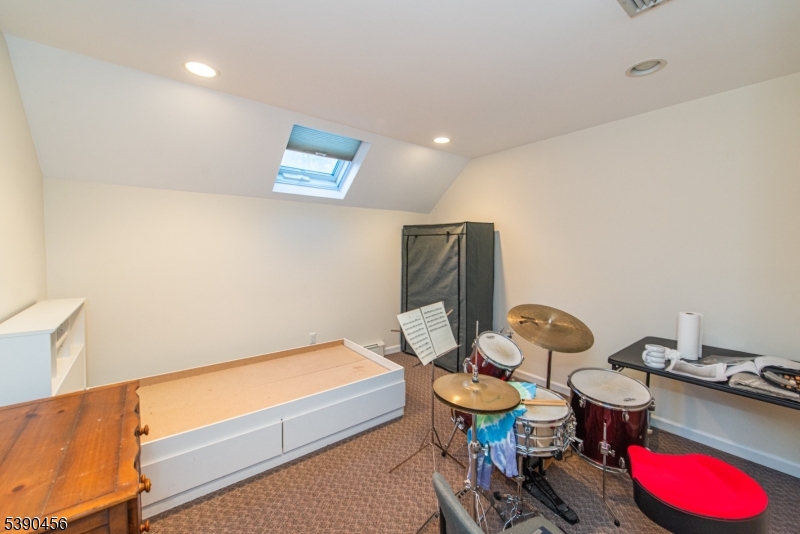 190 Andover Mohawk Road Andover, NJ 07821 - Photo 41 of 46 a living room with furniture and a wooden floor