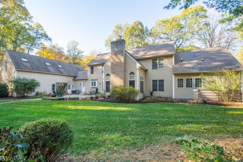 190 Andover Mohawk Road Andover, NJ 07821 - Photo 7 of 46 a front view of a house with a garden