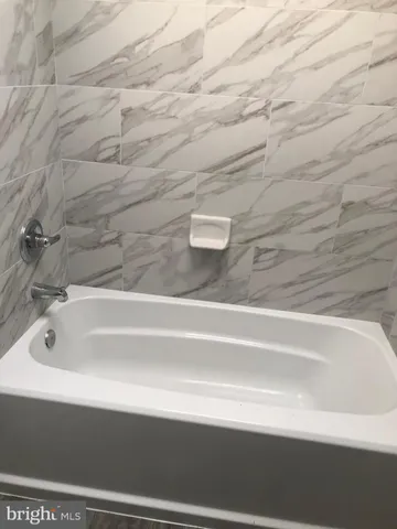a bathroom with a bathtub