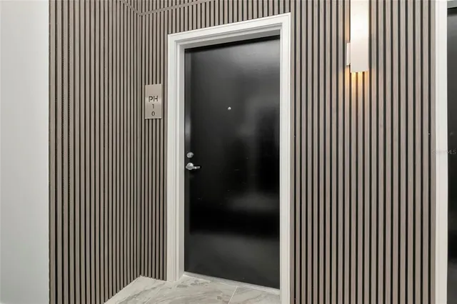 a view of a bathroom from a hallway