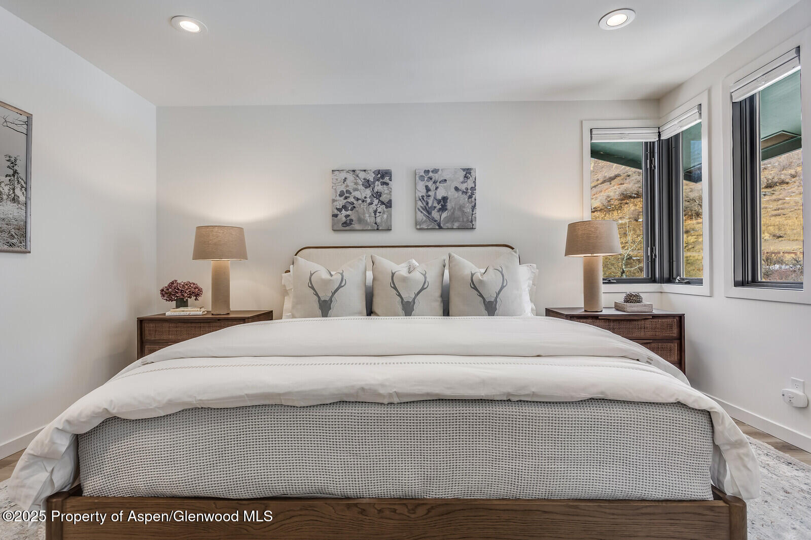 135 Carriage Way, Unit 5 Snowmass Village, CO 81615 - Photo 26 of 59 a large white bed in a white room