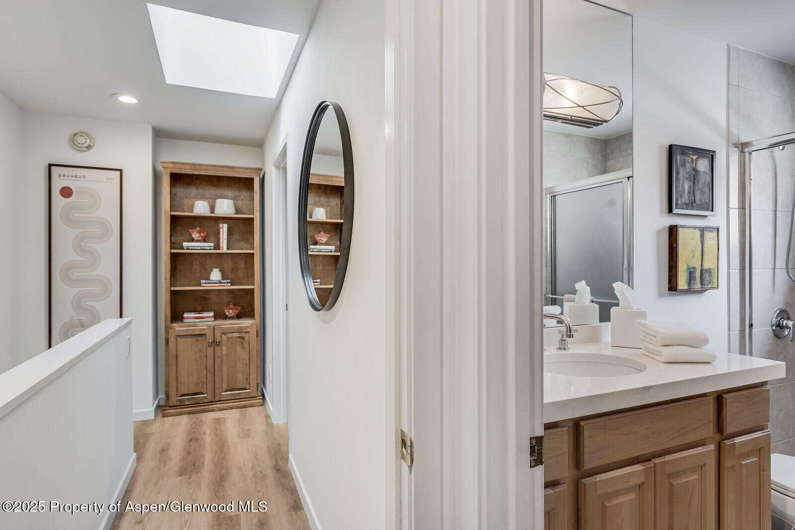 135 Carriage Way, Unit 5 Snowmass Village, CO 81615 - Photo 33 of 59 a bathroom with a sink a toilet and vanity