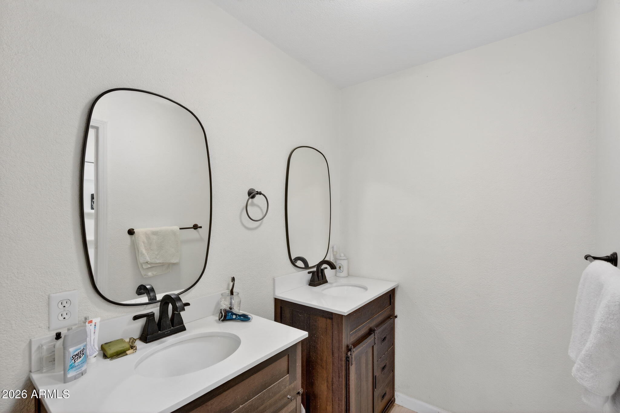 19500 West Bobcat Road Casa Grande, AZ 85122 - Photo 10 of 34 a bathroom with a sink and a mirror