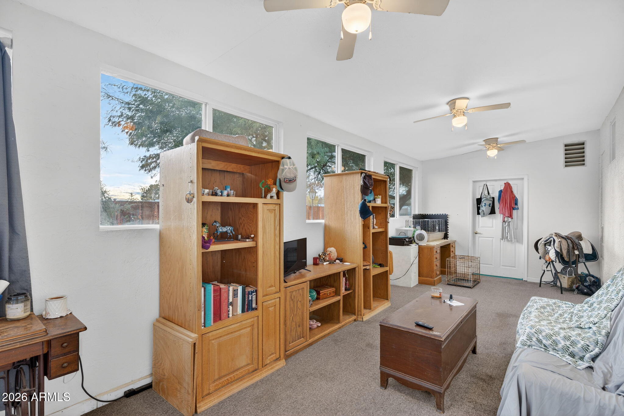 19500 West Bobcat Road Casa Grande, AZ 85122 - Photo 14 of 34 a living room with furniture and a flat screen tv