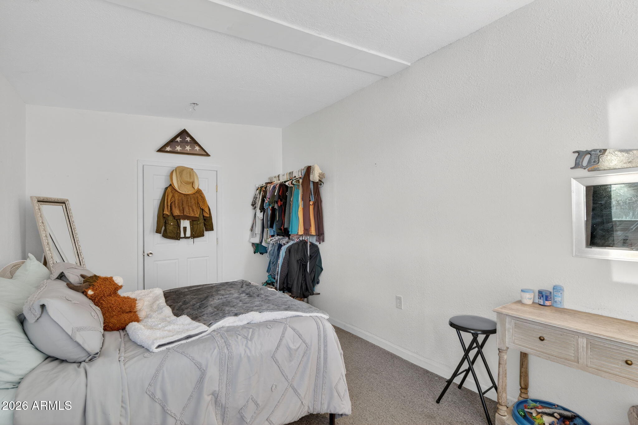 19500 West Bobcat Road Casa Grande, AZ 85122 - Photo 16 of 34 a bedroom with a bed and a window