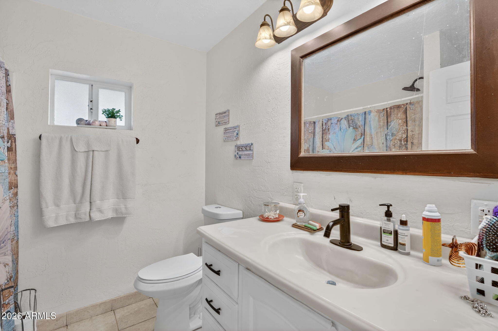 19500 West Bobcat Road Casa Grande, AZ 85122 - Photo 17 of 34 a bathroom with a sink and a toilet
