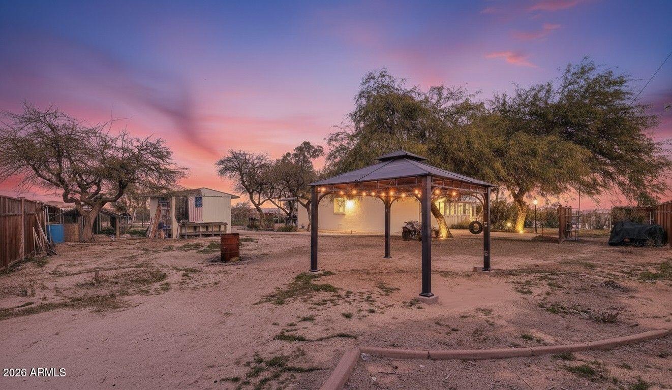 19500 West Bobcat Road Casa Grande, AZ 85122 - Photo 24 of 34 a backyard of a house with lots of green space
