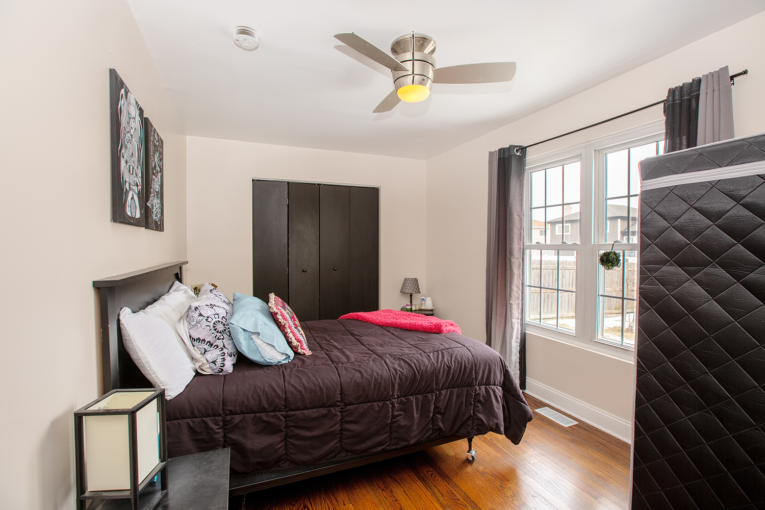 443 Danielle Road Matteson, IL 60443 - Photo 16 of 31 a bedroom with a bed and wooden floor