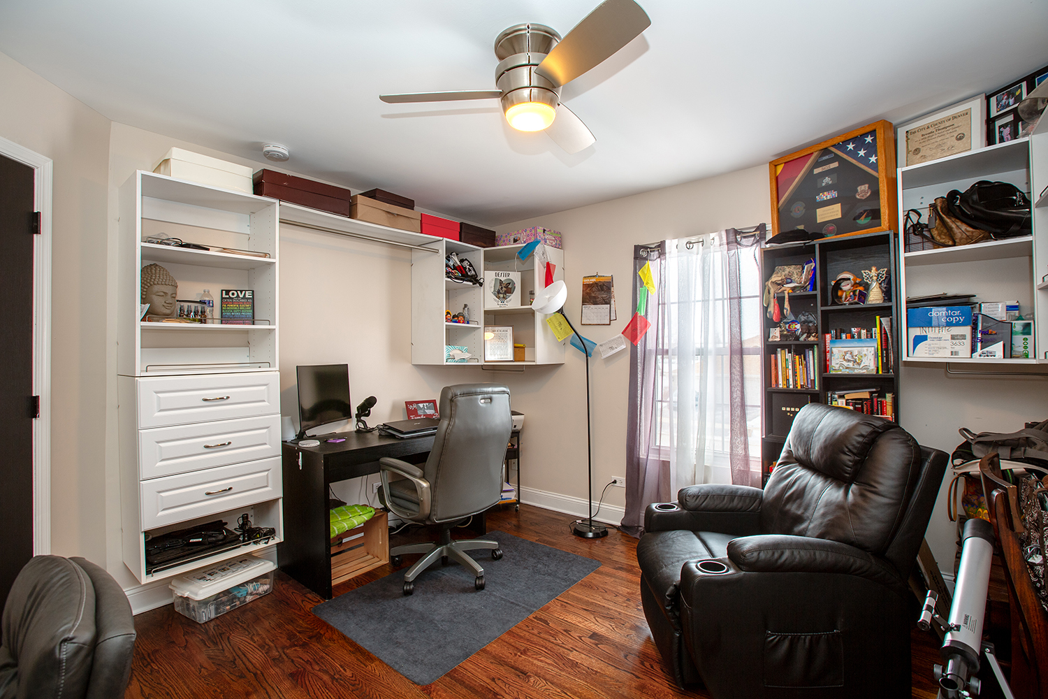 443 Danielle Road Matteson, IL 60443 - Photo 19 of 31 a view of a workspace with furniture and a bookshelf