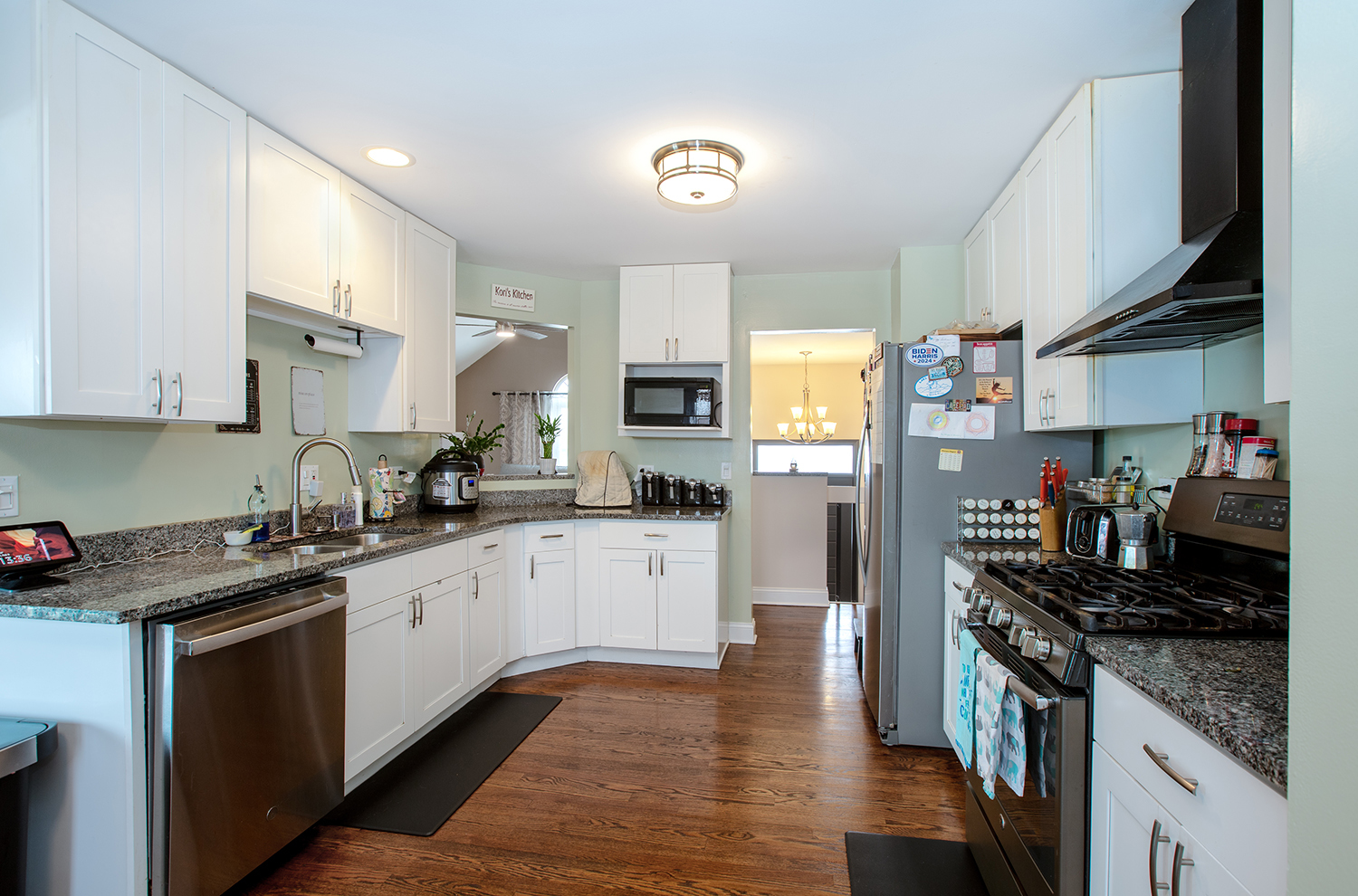 443 Danielle Road Matteson, IL 60443 - Photo 7 of 31 a kitchen with stainless steel appliances granite countertop a stove sink and refrigerator