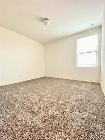 an empty room with a natural light